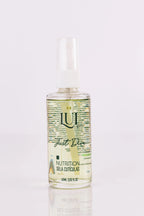 Just Diva Ampoule by Lui Glow in a clear glass bottle with a dropper, highlighting its vibrant liquid inside.